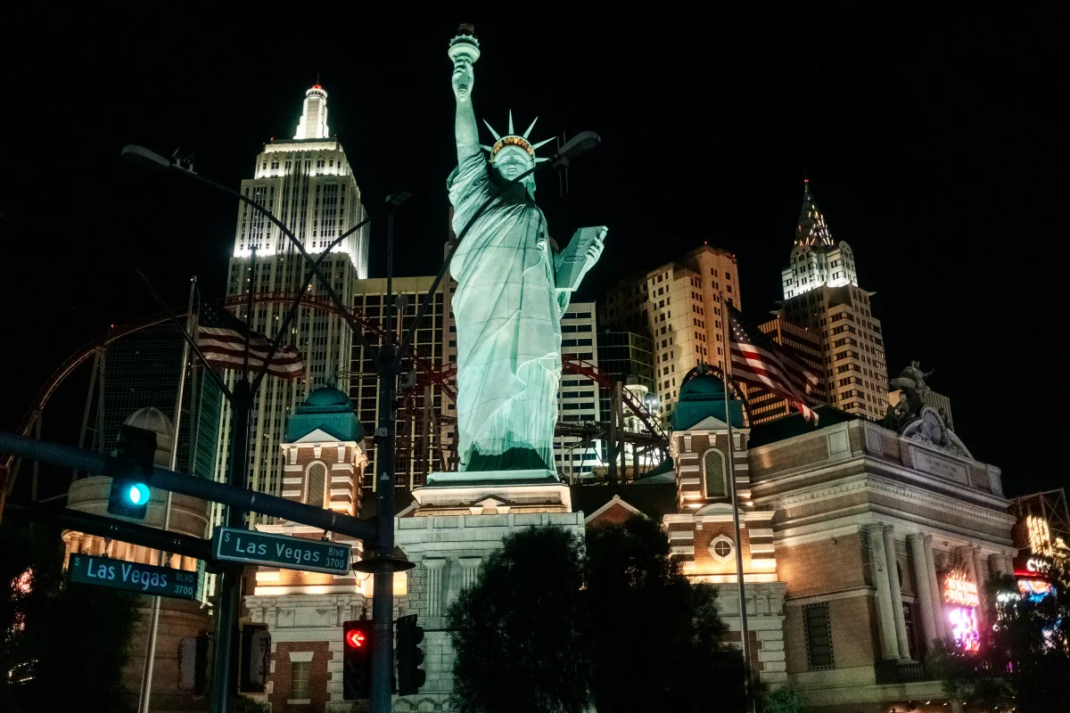 Statue of Liberty replica and skyline towers at New York-New York in Las Vegas at night