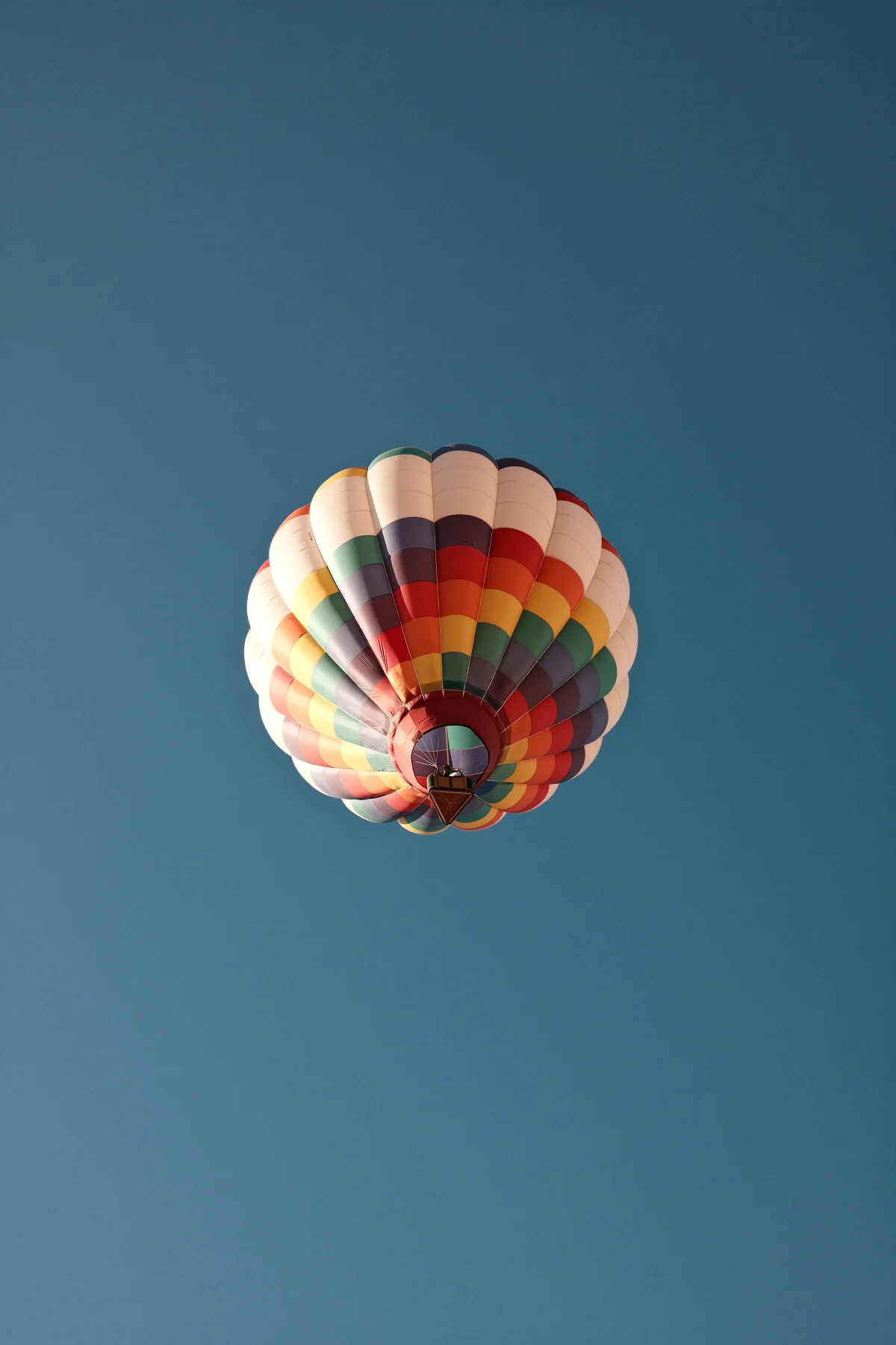 Rainbow hot air balloon seen from directly below at the Mesquite, Nevada balloon festival
