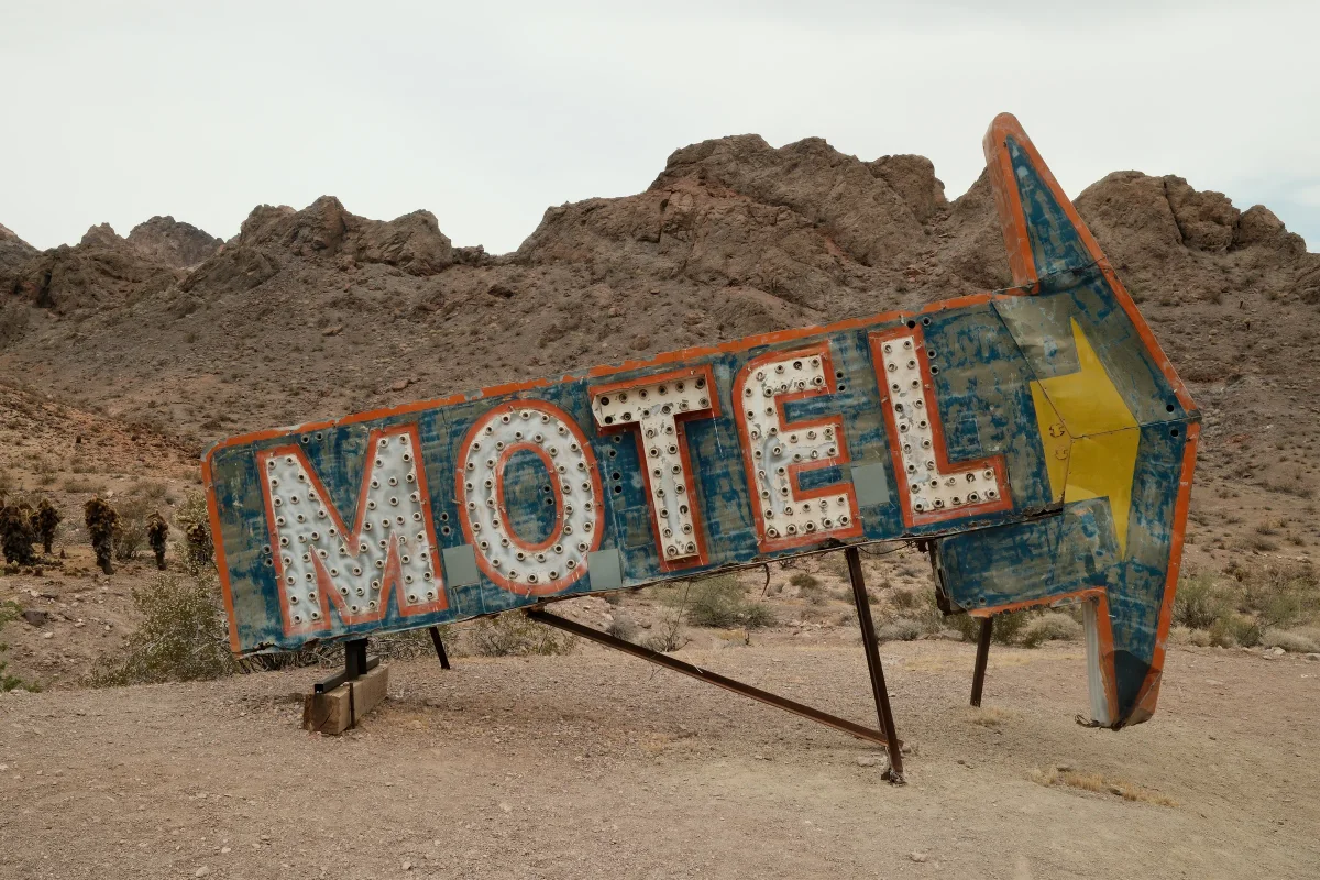 Retro MOTEL arrow sign standing in the desert at Nelson Ghost Town, Eldorado Canyon, Nevada